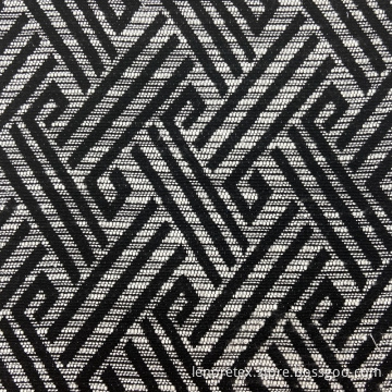Viskos/polyesterstickad svart vit geometriskt jacquardtyg